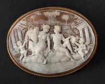 A 9ct gold, oval, shell cameo brooch, depicting a courting couple in a classical landscape,
