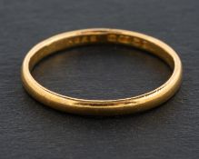 A 22ct gold band ring, with hallmarks for Birmingham, 1952, ring size O, total weight ca. 2.2gms.