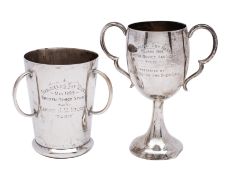An Indian unhallmarked silver three-handled presentation cup 'Darjeeling Sky Races 1909', 12.