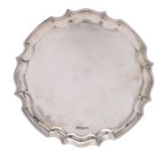A George V silver circular waiter, makers James Deakin & Sons,