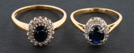 Two oval, mixed-cut sapphires and single-cut diamond cluster rings, including a 18ct gold ring,
