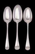 Three Hanoverian tablespoons: two by James Wilks, London 1742 and 1748, the other by Henry Norris,