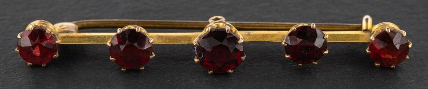 A garnet, five-stone, bar brooch, stamped '9CT', total length ca. 4.8cm, total weight ca. 2.
