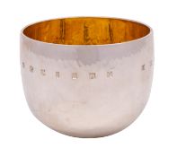 An Elizabeth II silver tumbler cup, makers Smith & Harris, London 19th May 2008,