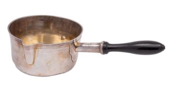 A late 18th/Early 19th Century French silver circular saucepan with single lipped bowl and turned