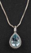An 18ct gold, pear-shaped, chequerboard-cut aquamarine and diamond cluster pendant,