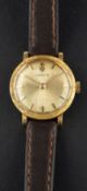 Corum, a dress wristwatch, the textured circular dial baton markers and hands,
