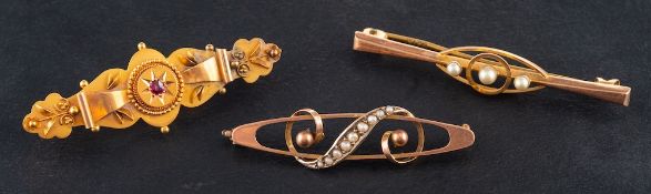 Three gemset brooches, a synthetic ruby brooch, stamped '15CT', length ca. 4.2cms, weight ca.