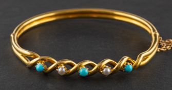 A mabe pearl and cabochon-cut turquoise hinged bangle, stamped '15', inner diameter ca. 5.