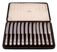 A set of twelve unmarked handled dessert knives, makers Walker & Hall,