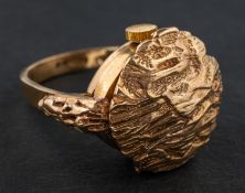 A 9ct gold Rotary watch cocktail ring, with bark-like textured hinged lid,