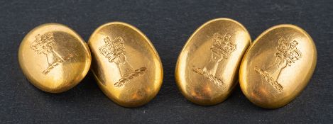 A pair of Victorian, 18ct gold, oval cufflinks, engraved with heraldic device,