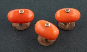A set of three coral dress studs, length of dress stud head ca. 1.2cm, total weight ca. 4.2gms.