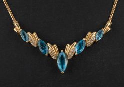 A marquise-shaped, blue topaz and diamond necklace, total estimated diamond weight ca. 0.