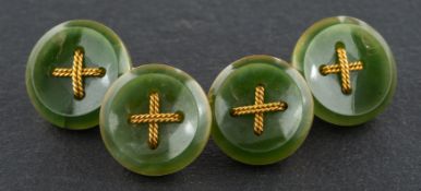 A pair of round, nephrite cufflinks, with decorative ropework, diameter of cufflink head ca. 1.