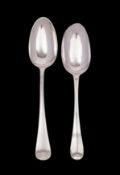 Two Hanoverian dessert spoons, one Britannia Standard with rat's tail decorated bowl,