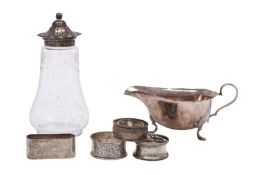 A collection of silver items comprising: A sauce boat maker Synyer and Beddoes, Birmingham 1929,
