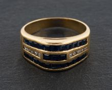 A calibre sapphire and single-cut diamond, three-row ring, total estimated diamond weight ca. 0.