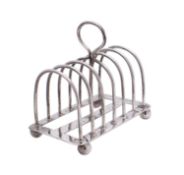 An Edward VII silver six-division toast rack, maker Mappin & Webb, Sheffield,