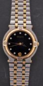 Gucci, a ladies quartz wristwatch the black dial signed Gucci, with inset paste stones at the hours,