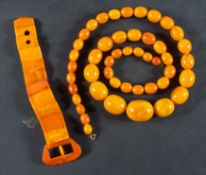 A graduated, amber bead necklace, diameter of beads ca. 10.7-28mms, total length ca.