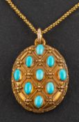 An Edwardian, oval, cabochon-cut turquoise pendant, of chequerboard design,
