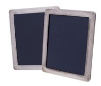 A pair of Elizabeth II silver easel photograph frames, makers Kitney & Co,