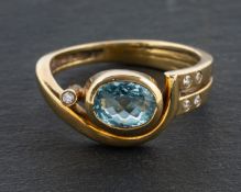 An oval, mixed-cut aquamarine and diamond cluster ring, estimated aquamarine weight ca. 0.