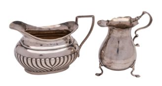 An Edward VII silver cream jug, maker Joseph Gloster, Birmingham, 1903: in the Georgian style,