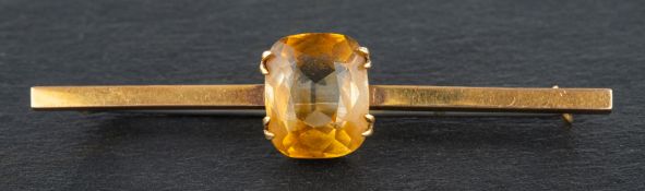 A cushion-cut, citrine bar brooch, estimated citrine weight ca.