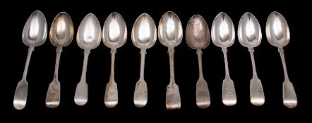 A group of silver Fiddle pattern provincial dessert spoons including three Exeter examples,