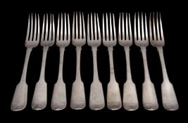 A set of nine George IV silver fiddle pattern table forks, maker William Eley,