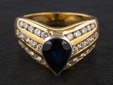 A pear-shaped sapphire and round, brilliant-cut diamond ring, estimated sapphire weight ca. 1.