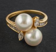 An 18ct gold, cultured pearl, marquise and step-cut diamond, cross-over ring,