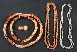 Three coral bead necklaces, including a multi-strand coral necklace, a single-strand coral necklace,