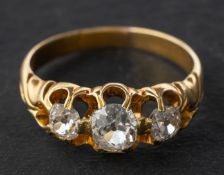 An old-cut diamond, three-stone ring, total estimated diamond weight ca. 0.