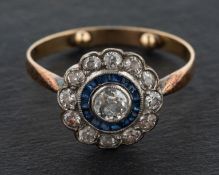 An Art Deco style, calibre cut sapphire and old-cut diamond target ring,