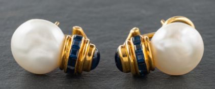 A pair of 18ct gold, cultured button pearls, cabochon and calibre-cut sapphire earrings,
