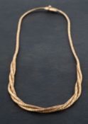 A textured, three-row, omega-link necklace, stamped '9K', total length ca. 42cm, total weight ca 21.
