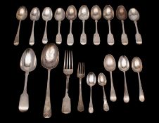 An assortment of silver cutlery including a set of four Victorian Fiddle pattern teaspoons,