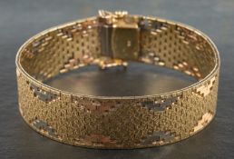 A tri-colour, 9ct gold, textured, brick-link bracelet, with import marks for London, 1977,