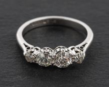 An old-cut diamond, four-stone ring, total estimated diamond weight ca. 0.