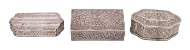 An Indian silver rectangular box with all over decoration of flowerheads and leaves, 13cm long,