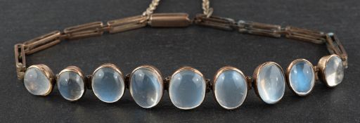 A gate-link, graduated, oval, cabochon-cut moonstone bracelet, length of moonstones ca. 6.9-10.