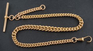 A graduated, curb-link Albert watch chain, with a dog clip and T-bar, the dog clip,