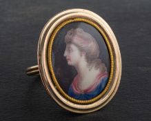 A 9ct gold, handpainted, oval, porcelain portrait ring, depicting portrait of a lady in profile,