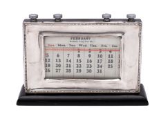 A George V silver mounted perpetual calendar, makers W.J. Myatt & Co.