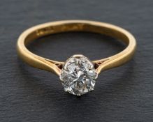 A round, brilliant-cut diamond, single-stone ring, estimated diamond weight ca. 0.