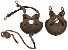 A pair of brass chest weights by C E Heinke & Co Ltd,London: of typical form, signed as per title,