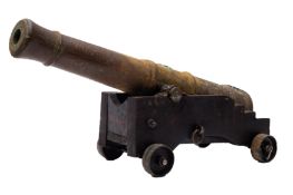 A George V cast iron desktop cannon: the 15 inch four stage barrel with crown and 'GR' cipher,